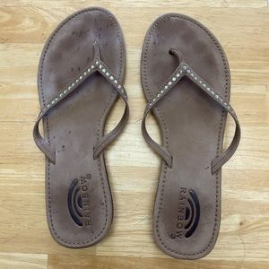 Rainbow flip flops with jeweled accents